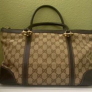 Gucci Beige and Dark Brown Monogram Tote.
Has date code .